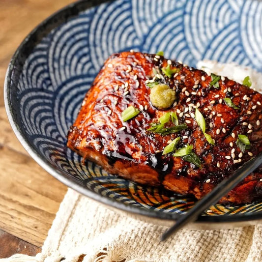 Japanese fusion teriyaki salmon on brown rice.