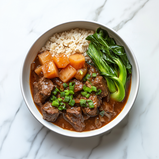 Hearty beef stew with radish on brown rice, zhuhou sauce.