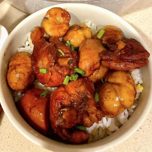 Soy sauce braised chicken with chestnuts and brown rice.