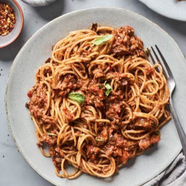 Italian fusion Spaghetti dish with rich beef Bolognese.